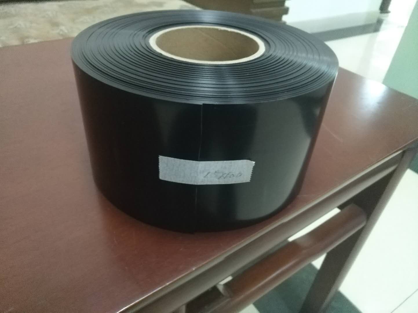 China HIGH STRENGTH BLACK/ WHITE UHMWPE TAPE WITH CORONA TREATED. for sale