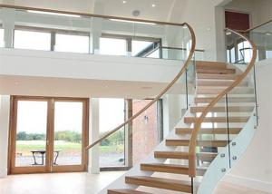 Cheap Solid Wood Apartment Stairs Carbon Steel Beam With Clear Tempered Glass Railing wholesale