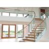 Buy cheap Solid Wood Apartment Stairs Carbon Steel Beam With Clear Tempered Glass Railing from wholesalers
