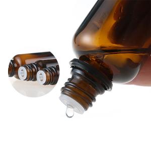 Cheap Empty Amber Cosmetic Essential Oil Glass Bottle With Tamper Evident Cap wholesale