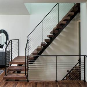 Metal staircase design with closed riser and posted glass railing