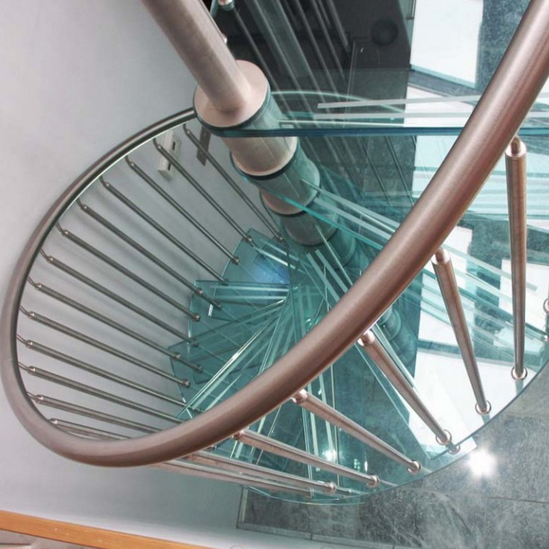 indoor decorative metal spiral stairs with laminated glass tread staircase