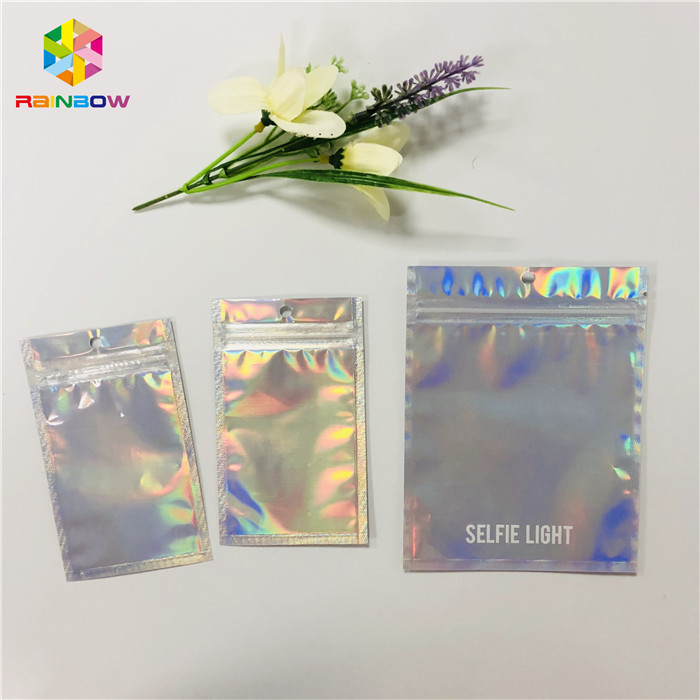 China Custom Cosmetic Packaging Bag Plastic Hologram Mylar Zipper With Clear Window on sale