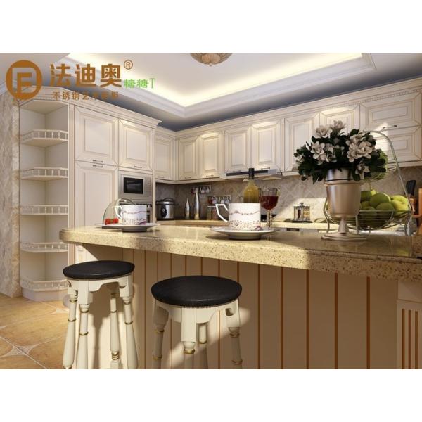 Classic French Kitchen Cabinets With Elegant Curved Displays And Functional Island