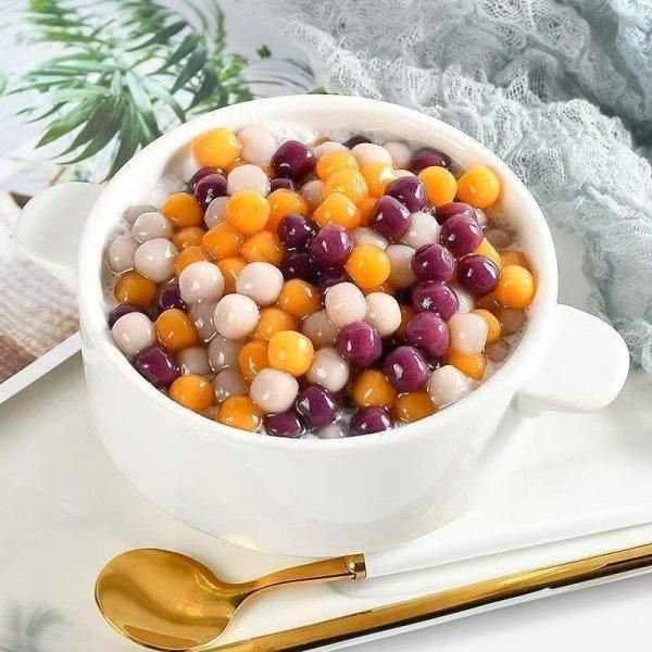 Close-up of colorful taro balls in a bowl