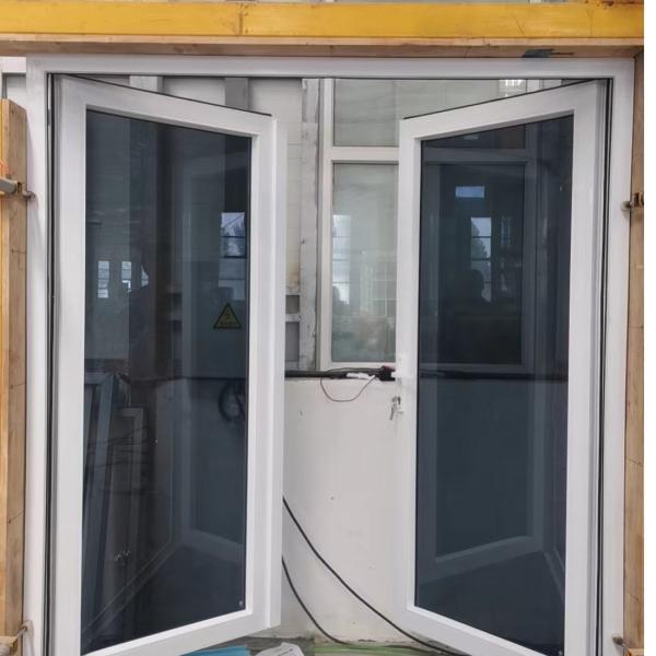 Windproof Double Double Hinged Glass Doors PVC Impact Resistant Glass Door ODM
