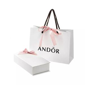 Cheap Tear Resistant 80gsm-120gsm Kids Clothing Paper Bags Custom Logo wholesale