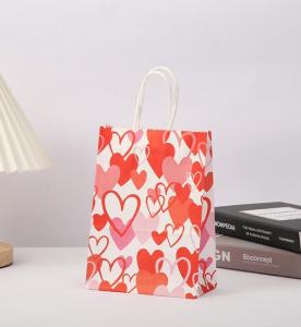 Cheap Red 80gsm Kraft Paper Gift Bags Love Heart Printed Paper Goodie Bags With Handles wholesale