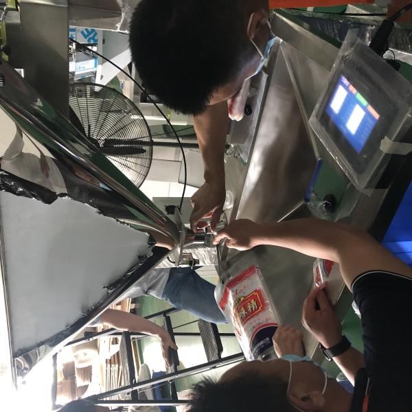 SUS304 Four Heads Linear Weigher Packing Machine Full Colour LCD Touch Panel Controlled