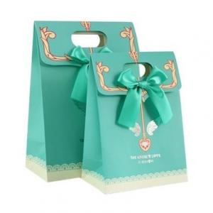China Beauty Products Recycled Paper Gift Bags Paper Bag With Ribbon Recyclable Customized on sale