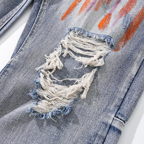OEM Washed Blue Ripped Jeans Unisex Split Pants With Graffiti Denim Manafacturer