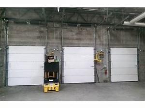 Cheap Exterior Roll Up Overhead Sectional Industrial Vertical PU Panel Insulated Workshop Dock Doors wholesale